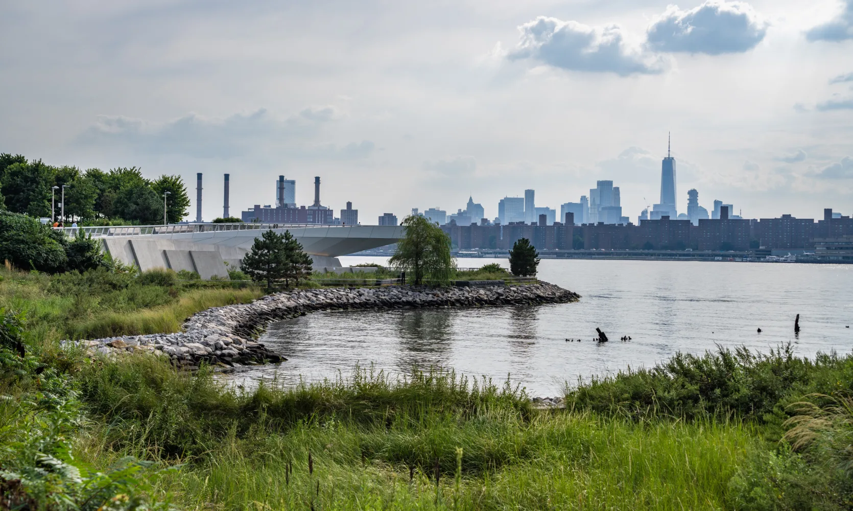 View across the east river of the midtown skyline from the Hunter's Point South Park inlet.