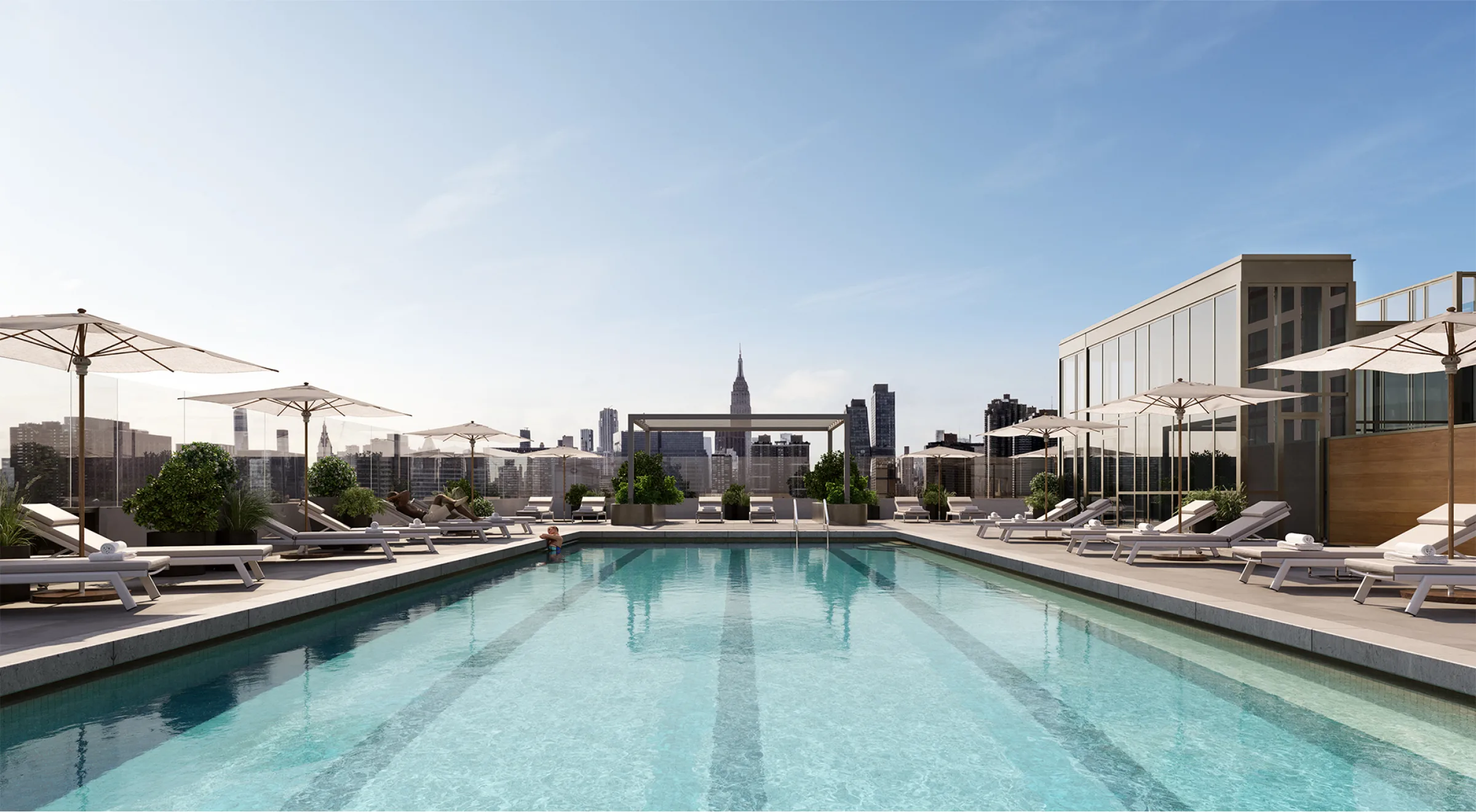 Malt Dr's rooftop pool and sundeck looking west with the Empire State building in the background.