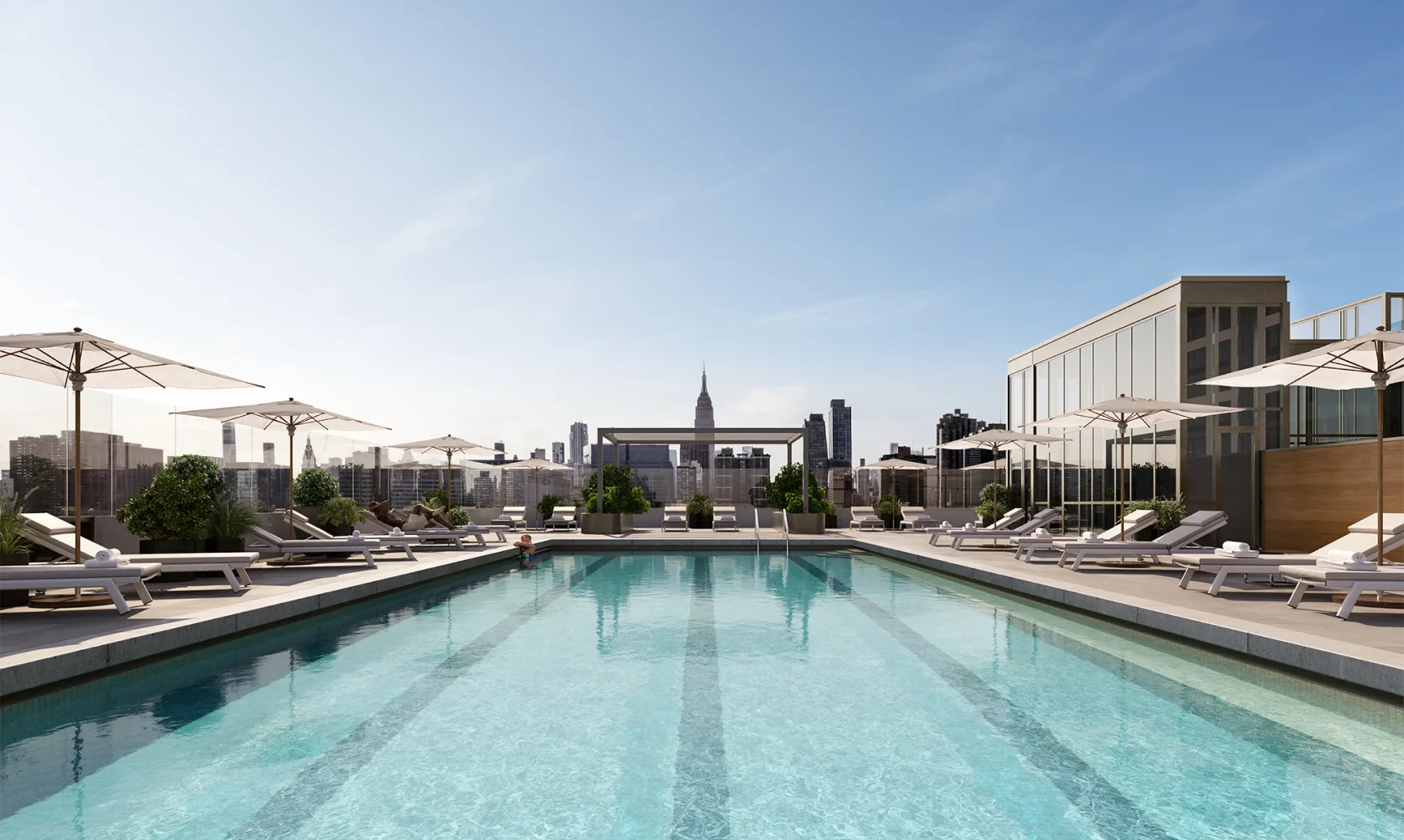 Malt Dr's rooftop pool and sundeck looking west with the Empire State building in the background.