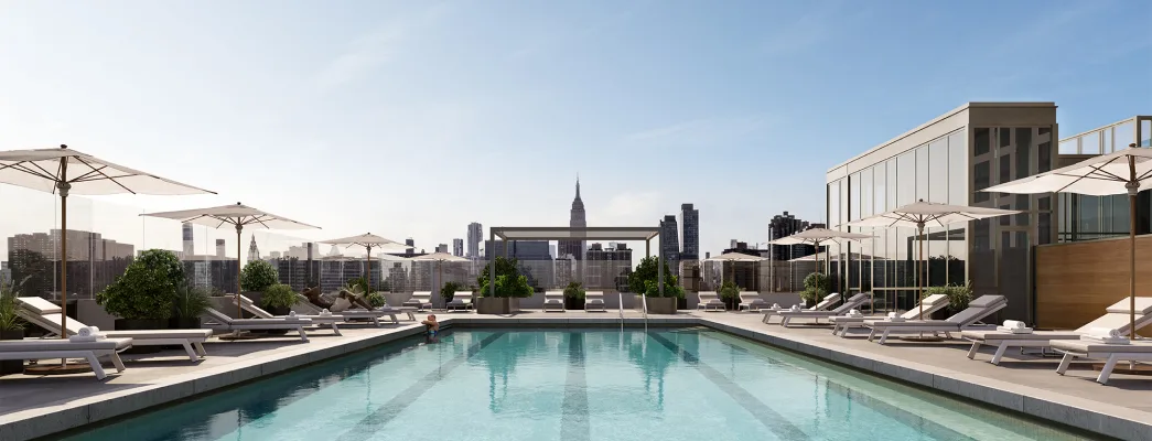 Malt Dr's rooftop pool and sundeck looking west with the Empire State building in the background.