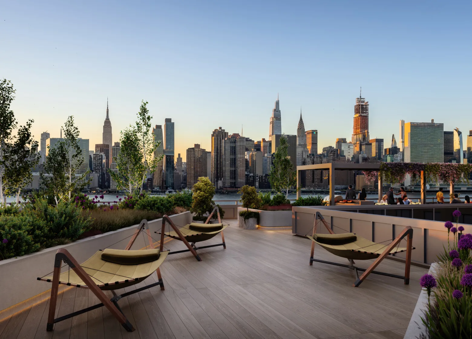 2-21 Malt Dr's rooftop terrace looking west with the East River and Midtown Manhattan's skyline in the background.