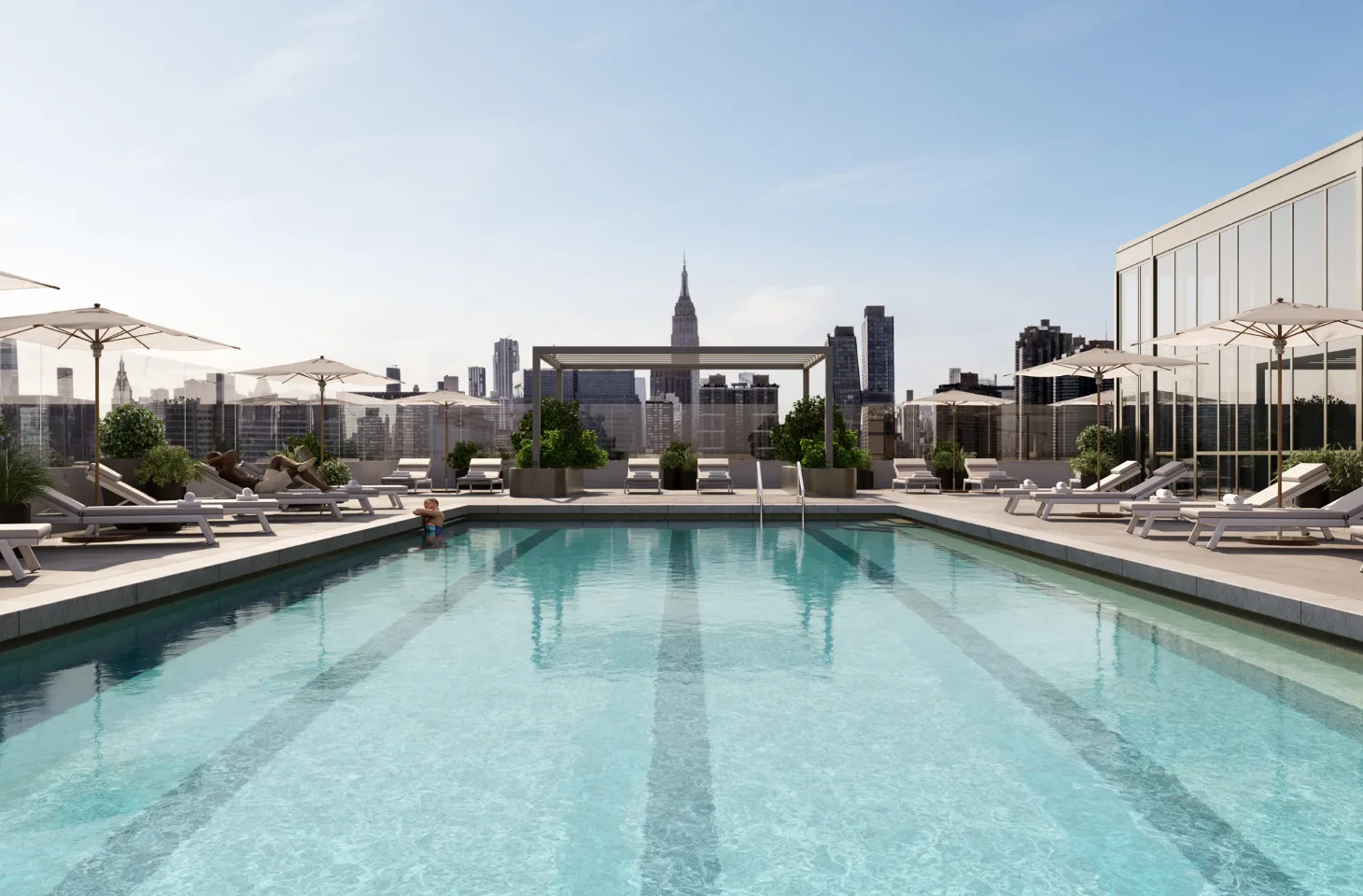 Malt Dr's rooftop pool and sundeck looking west with the Empire State building in the background.