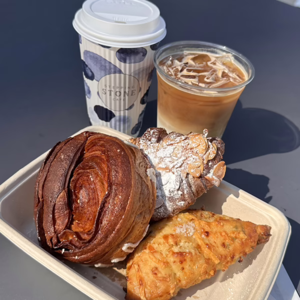 Stepping Stone Fresh pastries with hot and iced coffee from Stepping Stone Café, served outdoors at Malt Drive.